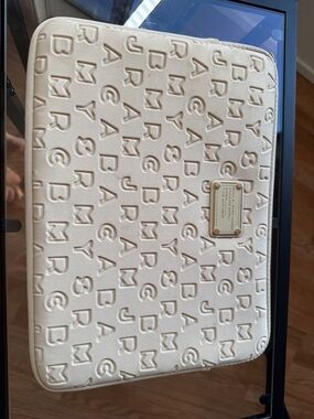 13” Marc by Marc Jacobs Cream Embossed Logo Laptop Sleeve with Gold Plate